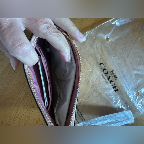 Coach Pink Floral and Butterfly Women's Wristlet - Picture 2 of 4